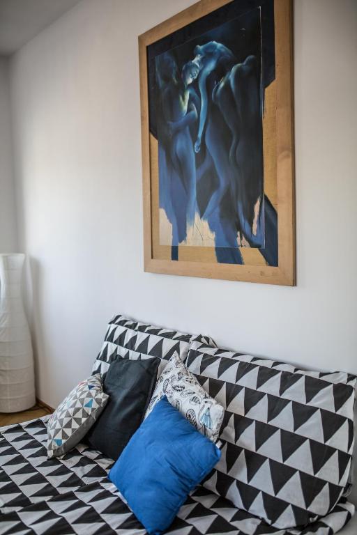 Posteľ alebo postele v izbe v ubytovaní Apartament Batory