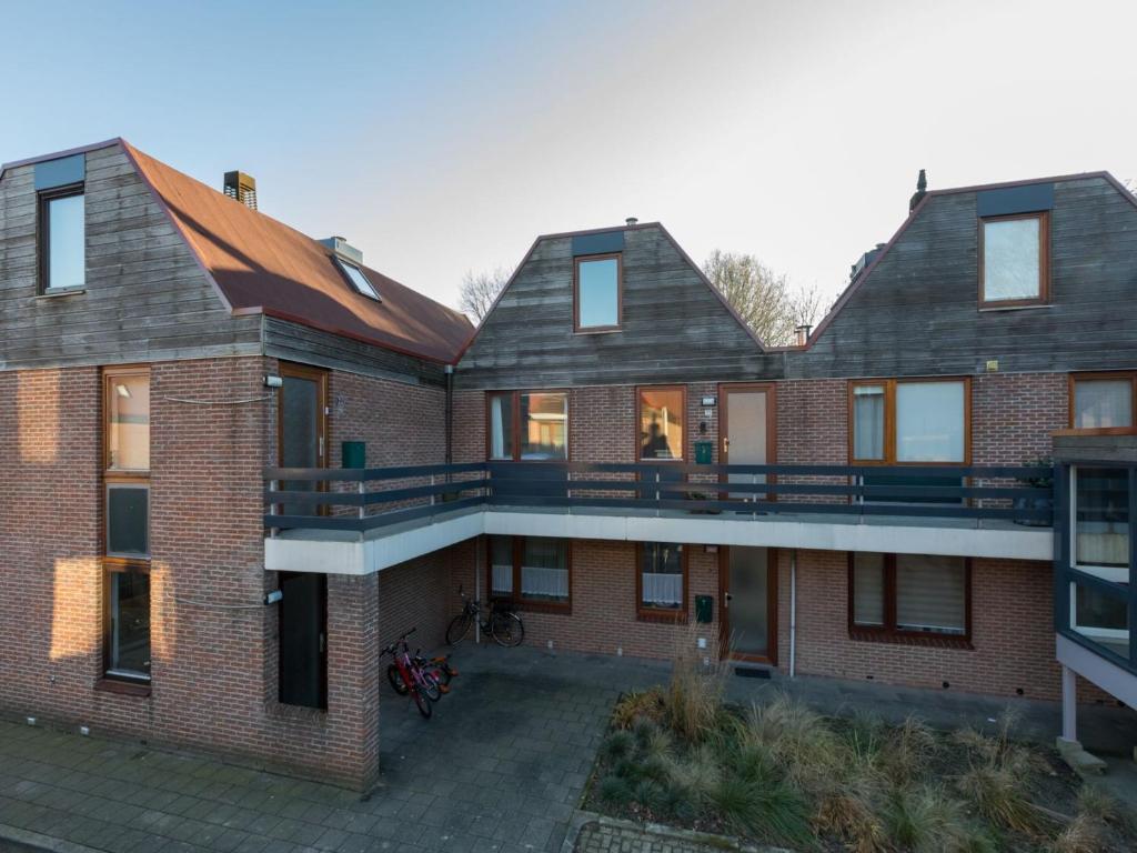an aerial view of a brick building at Apartment in Veere near Lake Veerse Marina in Veere