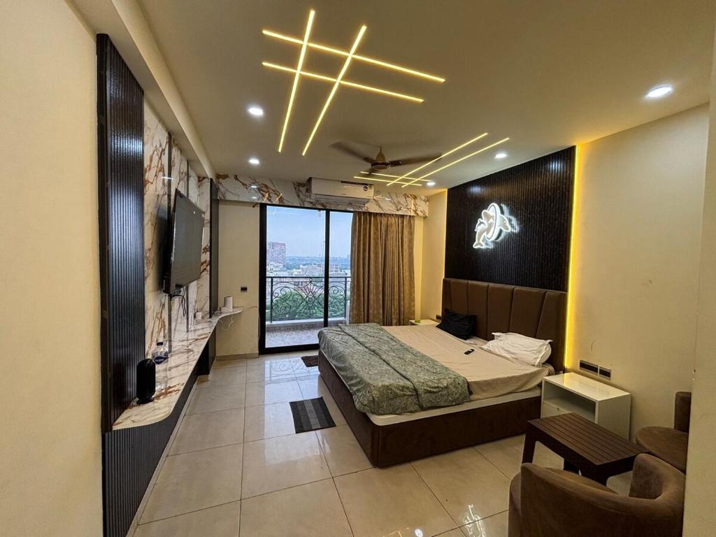 TV a/nebo společenská místnost v ubytování The Ganj Studio