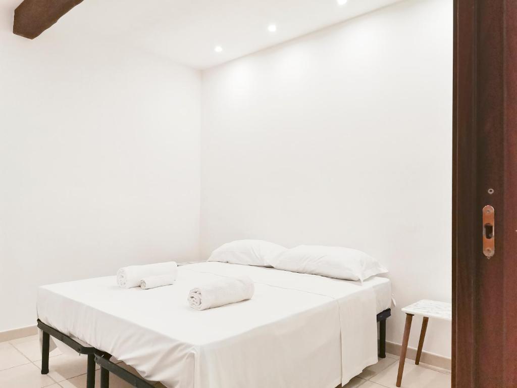 Ένα ή περισσότερα κρεβάτια σε δωμάτιο στο Rogadeo34