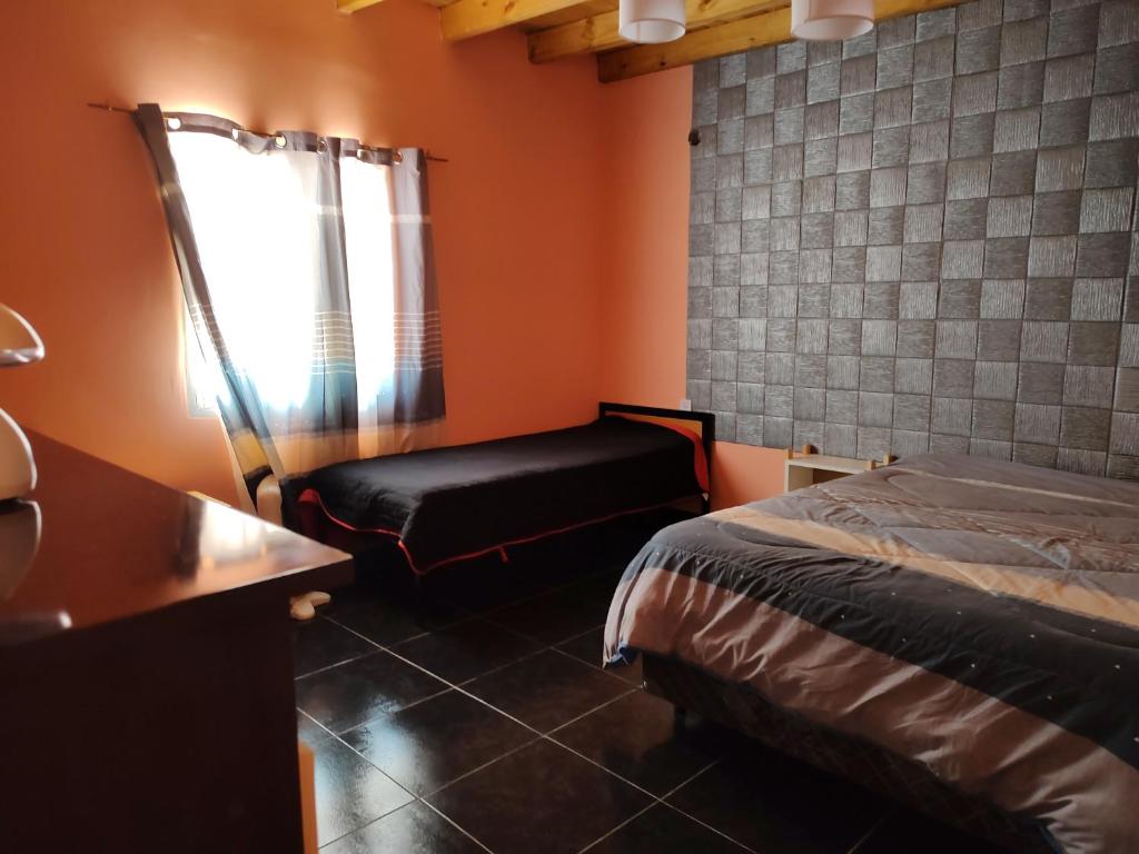 Postel nebo postele na pokoji v ubytování Hospedaje Diego Fabián