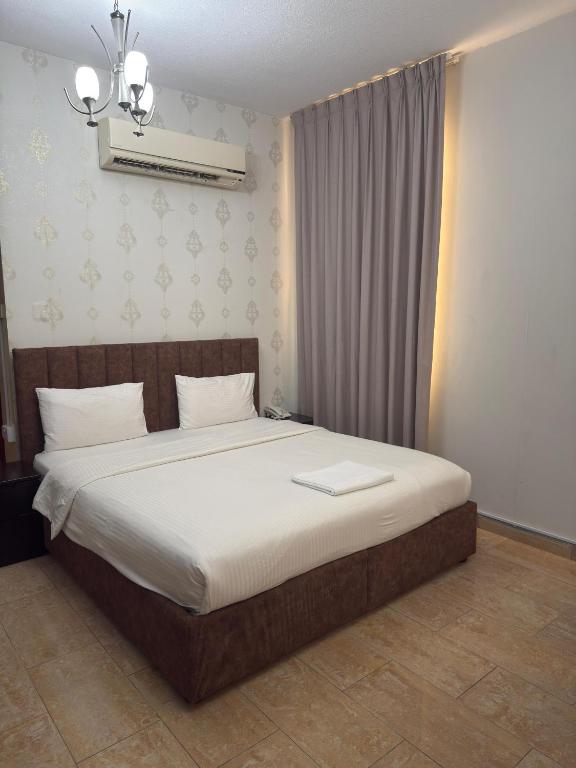 Al zain hotel apartment - Resim 2