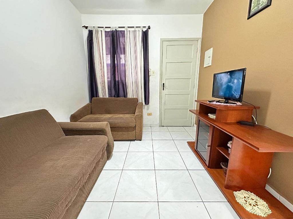 TV a/nebo společenská místnost v ubytování 1 Dorm Pé na Areia – Praia Guilhermina