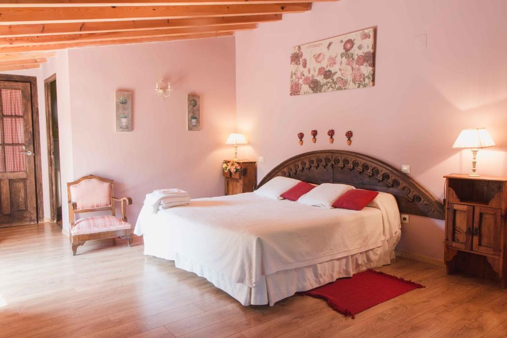 A bed or beds in a room at Finca El Carpintero