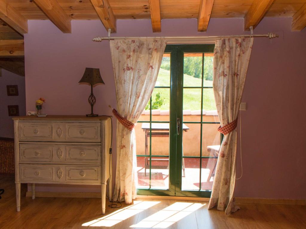A bed or beds in a room at Finca El Carpintero