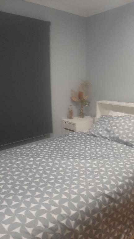 Una cama o camas en una habitación de Tia Margarita