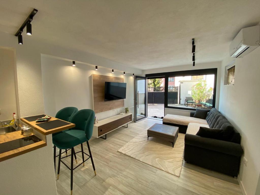 Et tv og/eller underholdning på GRBAVICA COZY APARTMENT - free parking