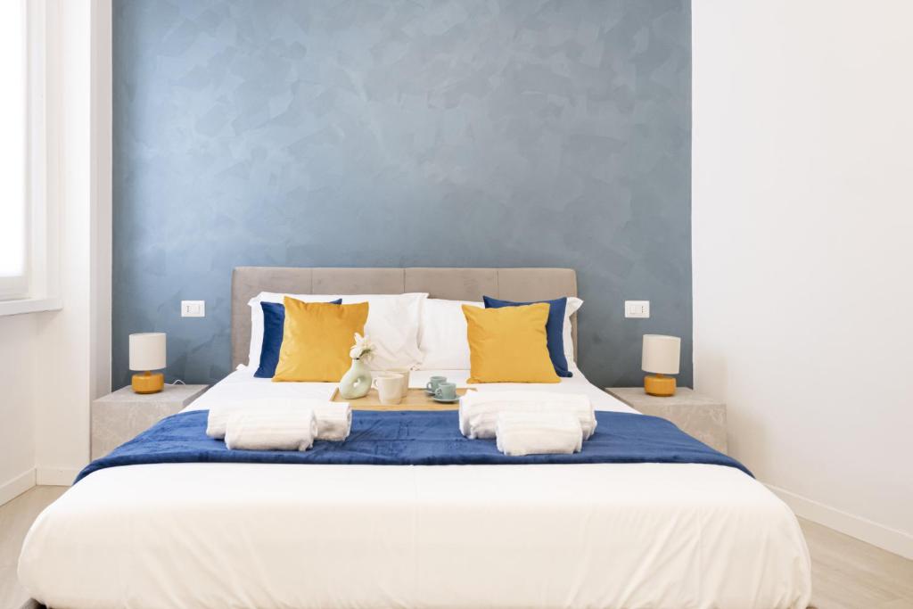 Ένα ή περισσότερα κρεβάτια σε δωμάτιο στο Easylife - Milano - Aurispa 2 - Navigli