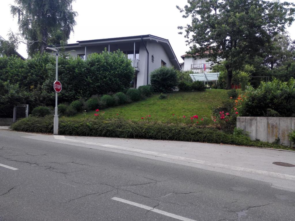 a stop sign on the side of a street at Katarina in Bled