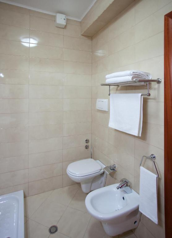 Koupelna v ubytování Orchidea Hotel