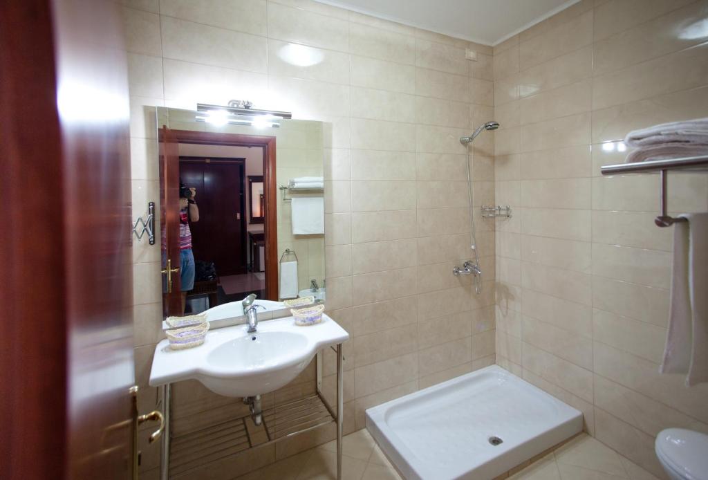 Koupelna v ubytování Orchidea Hotel