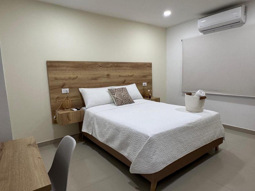 Postel nebo postele na pokoji v ubytování Apartamento en Riohacha, Mystic House