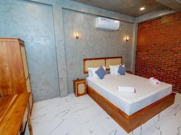 Кровать или кровати в номере Dutch Canel Retreat Boutique Villa With Free Airport Pickup