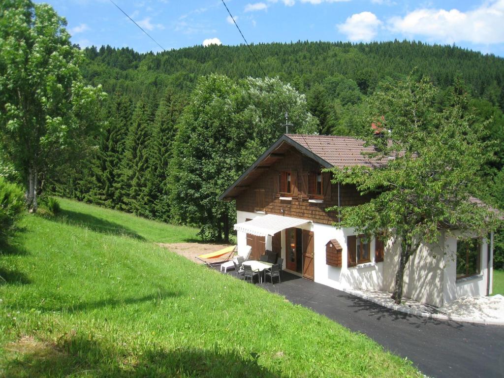 a small house on the side of a hill at Chalet in Ventron near Ski Lift in Ventron