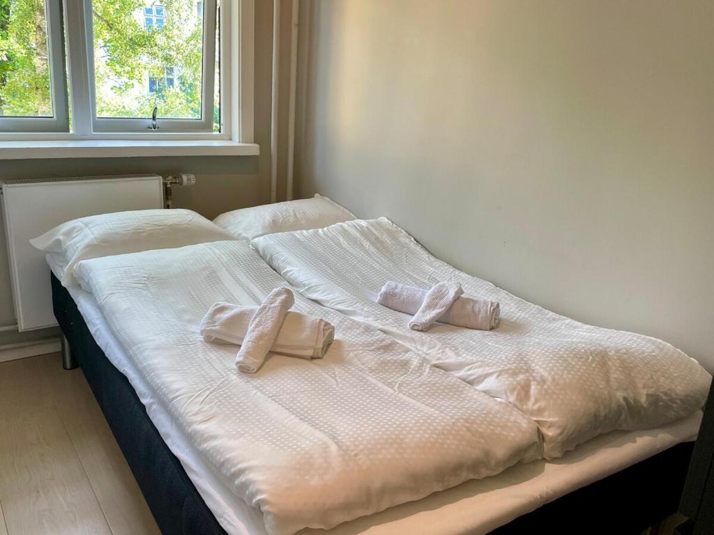 Ένα ή περισσότερα κρεβάτια σε δωμάτιο στο Modern Apartment