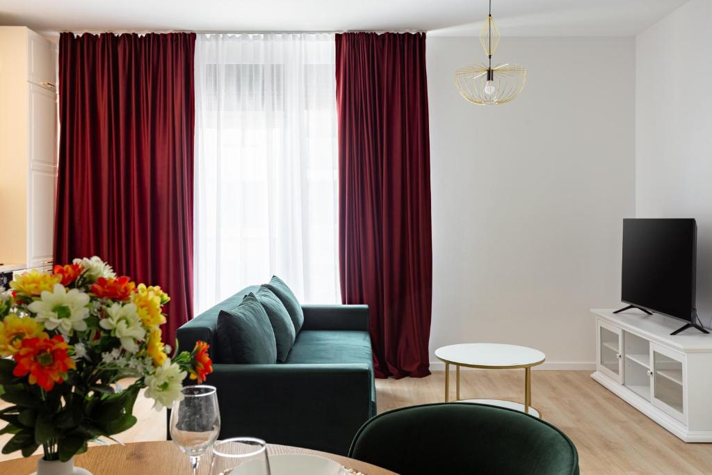 Et tv og/eller underholdning på Sika Winn Premium Apartment- private parking