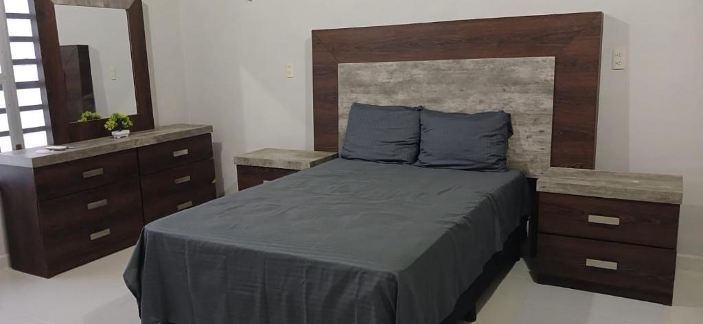 Ένα ή περισσότερα κρεβάτια σε δωμάτιο στο Villa Prix