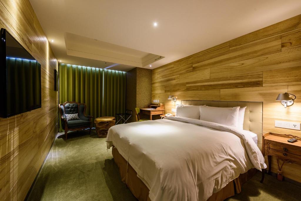 Postel nebo postele na pokoji v ubytování Inhouse Hotel Taichung