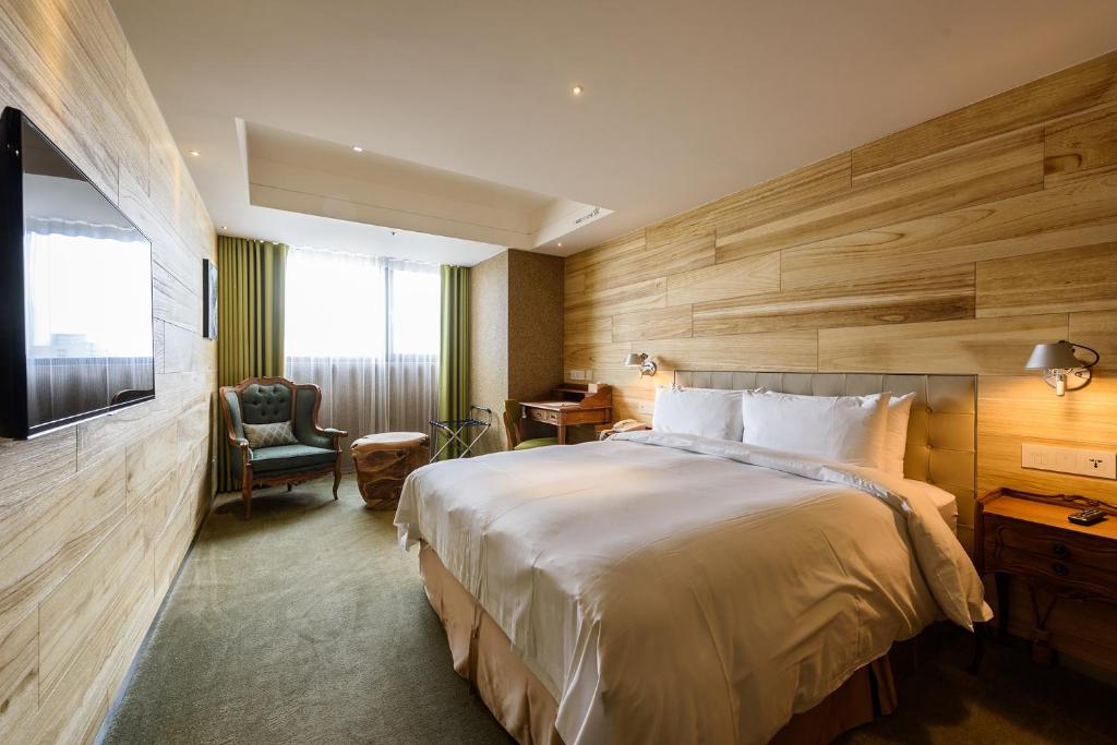 Postel nebo postele na pokoji v ubytování Inhouse Hotel Taichung