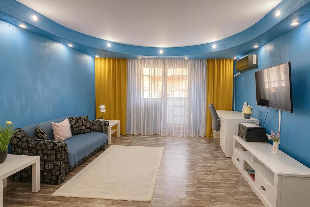 Μια τηλεόραση ή/και κέντρο ψυχαγωγίας στο Grand Apartments