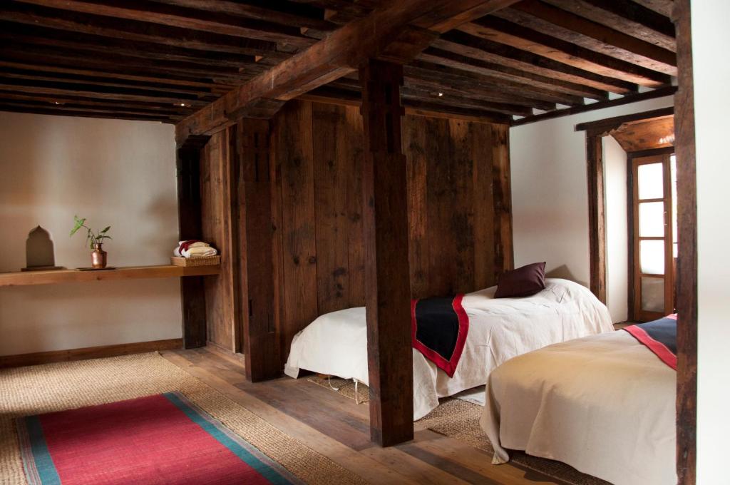 Postel nebo postele na pokoji v ubytování The Inn Patan