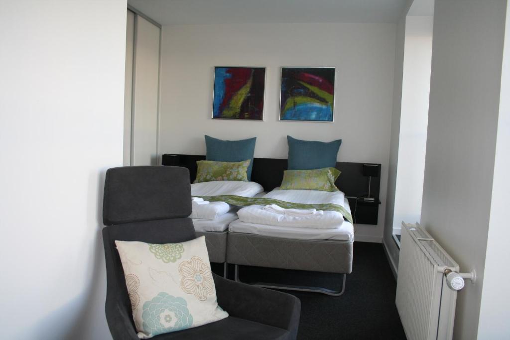 Postel nebo postele na pokoji v ubytování Seaside Hotel Thyborøn