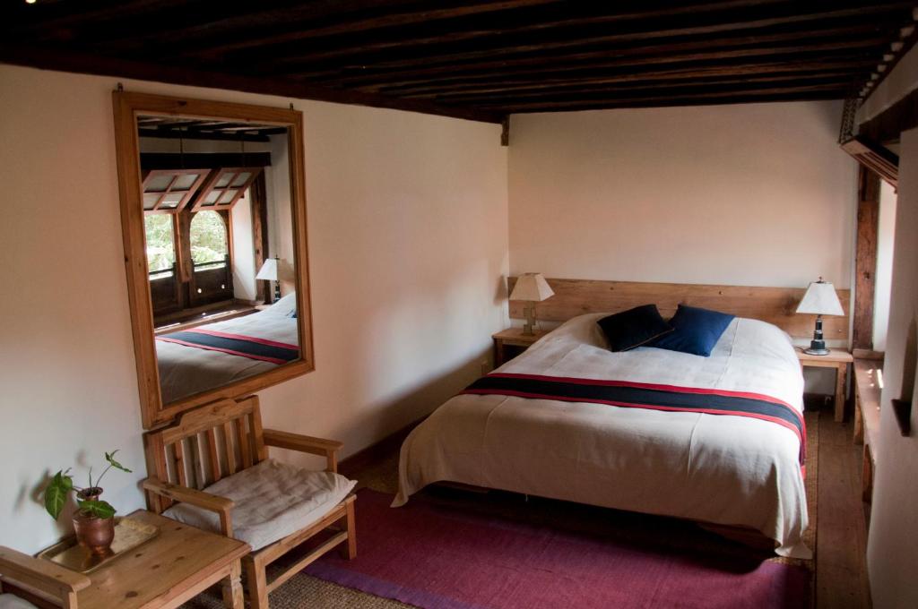 Postel nebo postele na pokoji v ubytování The Inn Patan