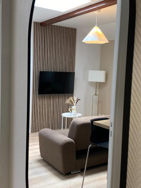 TV a/nebo společenská místnost v ubytování Apartment T2
