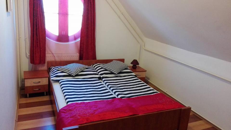 Postel nebo postele na pokoji v ubytování Juniperus Park Hotel Kecskemét