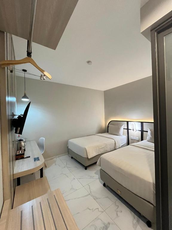 Front One Harvest Hotel Wonosobo - Habitación Doble