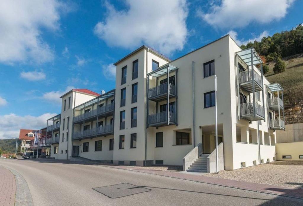 a row of buildings on the side of a street at Hotel Gasthof Heckl in Kinding