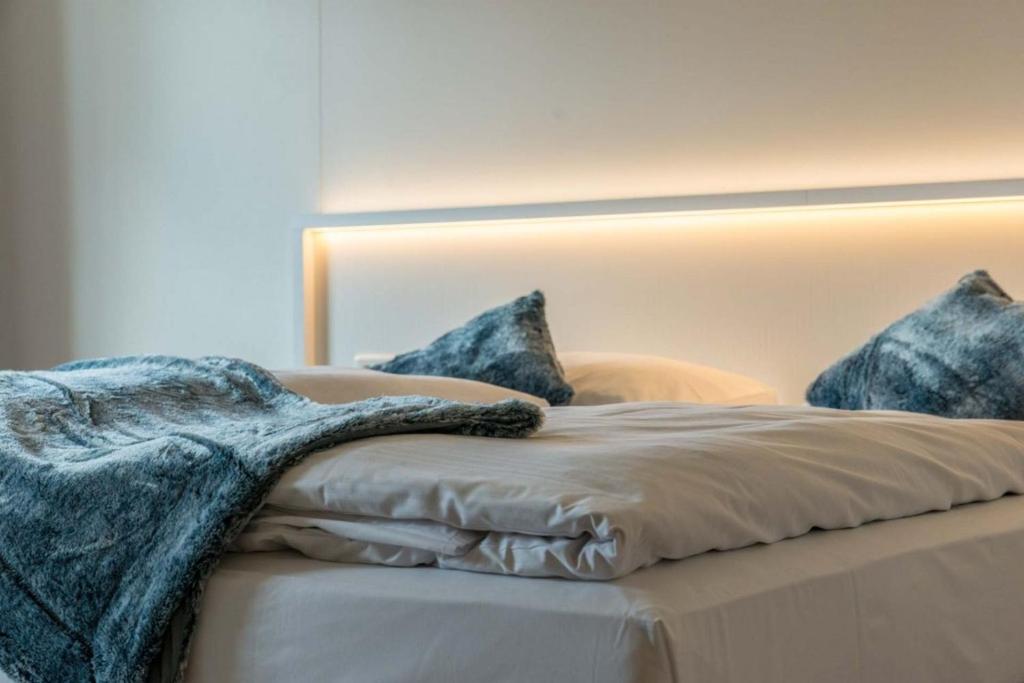 Postel nebo postele na pokoji v ubytování Hotel Gasthof Heckl