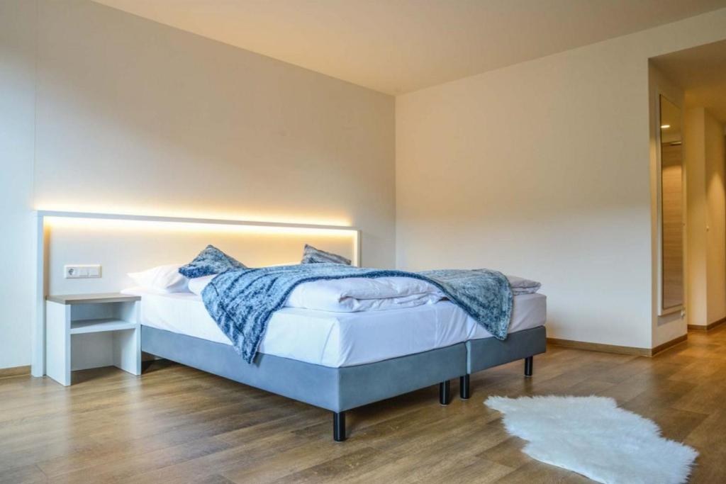 Postel nebo postele na pokoji v ubytování Hotel Gasthof Heckl
