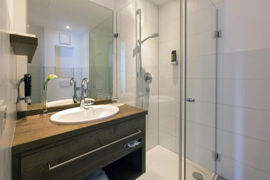 Koupelna v ubytování Hotel am Schrannenplatz