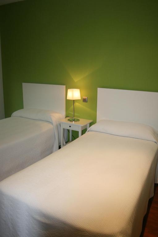 Postel nebo postele na pokoji v ubytování Apartamentos TH Las Rozas