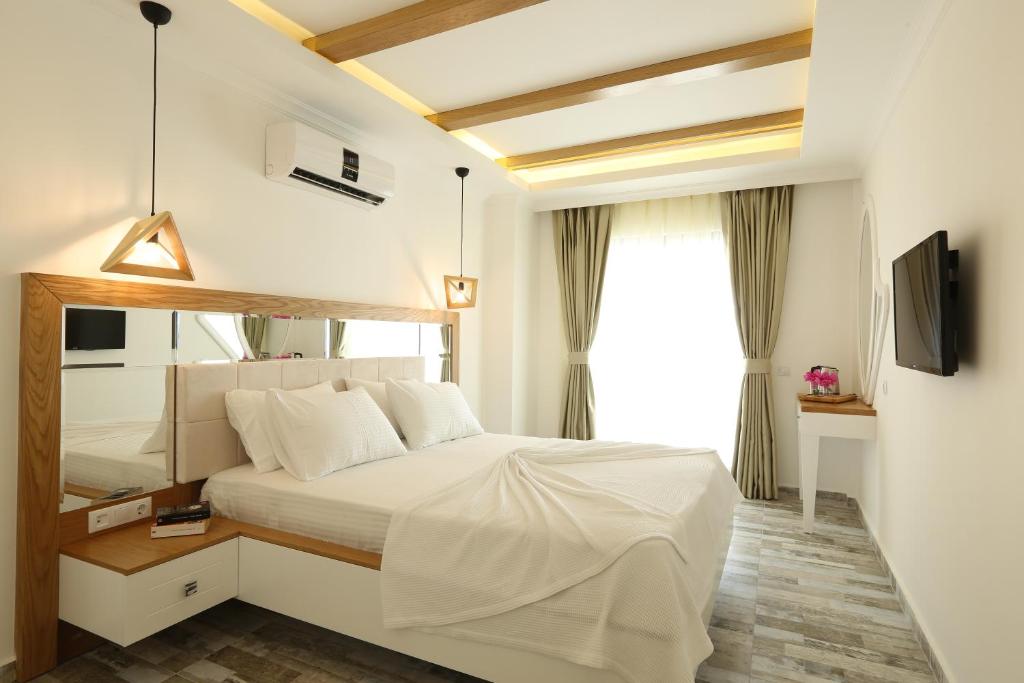 Postel nebo postele na pokoji v ubytování Payam Hotel