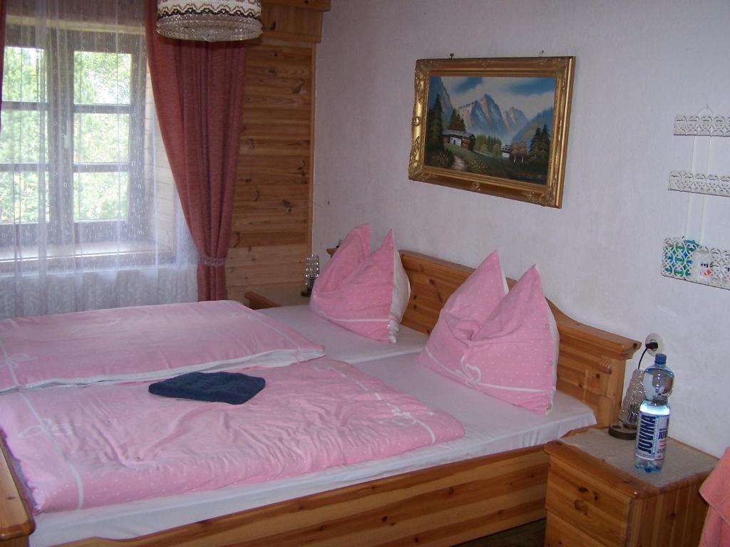 Postel nebo postele na pokoji v ubytování Gasthof Gangl