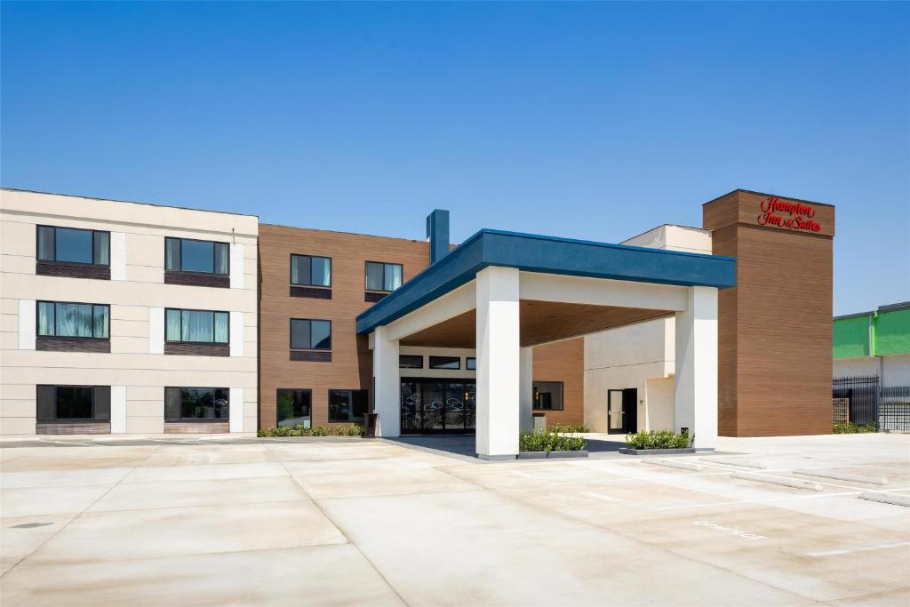 an empty parking lot in front of a building at Hampton Inn & Suites San Diego Seaworld in San Diego