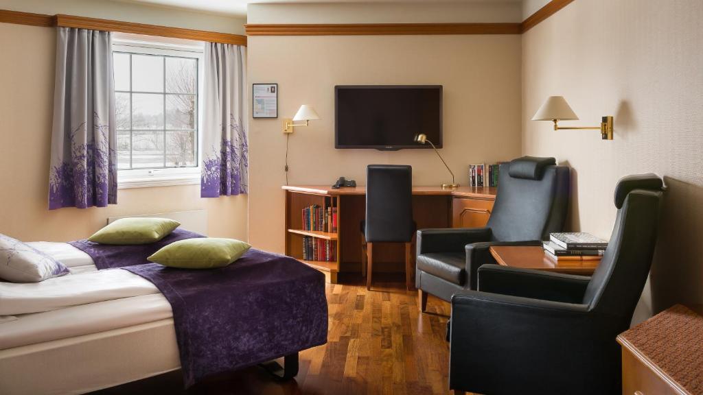 TV a/nebo společenská místnost v ubytování Quality Hotel Olavsgaard