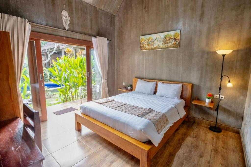 فضای داخلی Elemento Homestay Badung در بالی - تصویر ۳