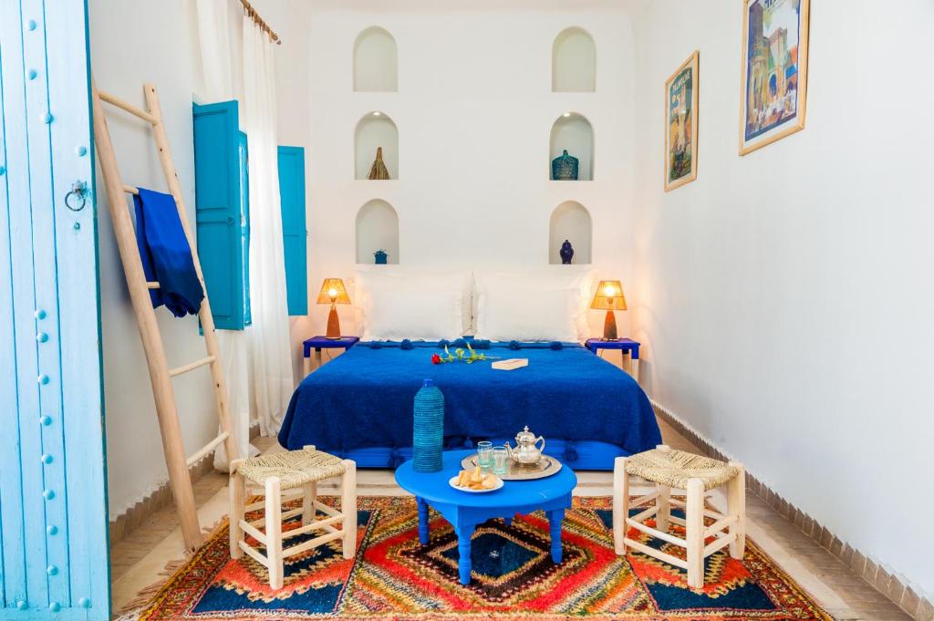 Postel nebo postele na pokoji v ubytování Riad Chamali