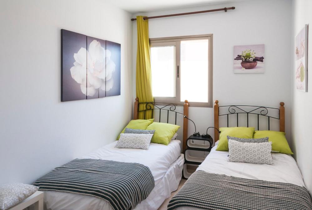 Postel nebo postele na pokoji v ubytování Apartment Poris Sunrises