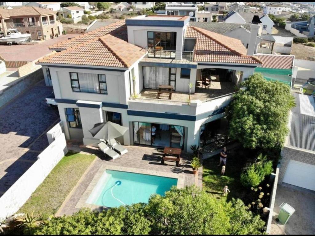 an aerial view of a house with a swimming pool at Alabaster Luxe Villa in Langebaan