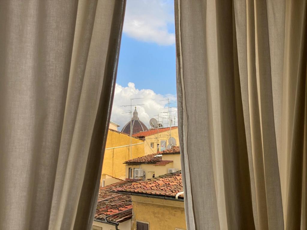 a view of a city from a window at Indipendenza 1 in Florence
