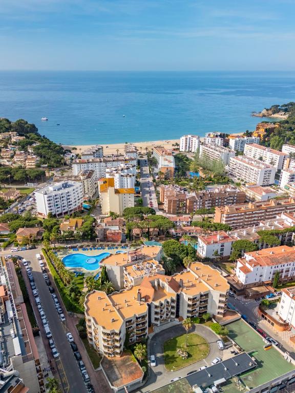 an aerial view of a city and the ocean at AR Bolero park in Lloret de Mar