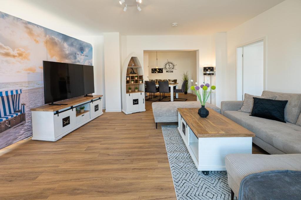 TV a/nebo společenská místnost v ubytování Captains Nest - Modernes, zentrales Apartment mit Parkplatz von STAY YOUR WAY