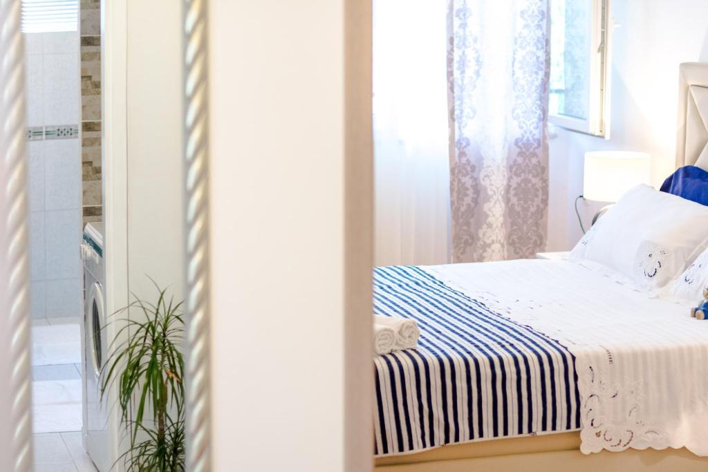 Posteľ alebo postele v izbe v ubytovaní Apartment Mandalina