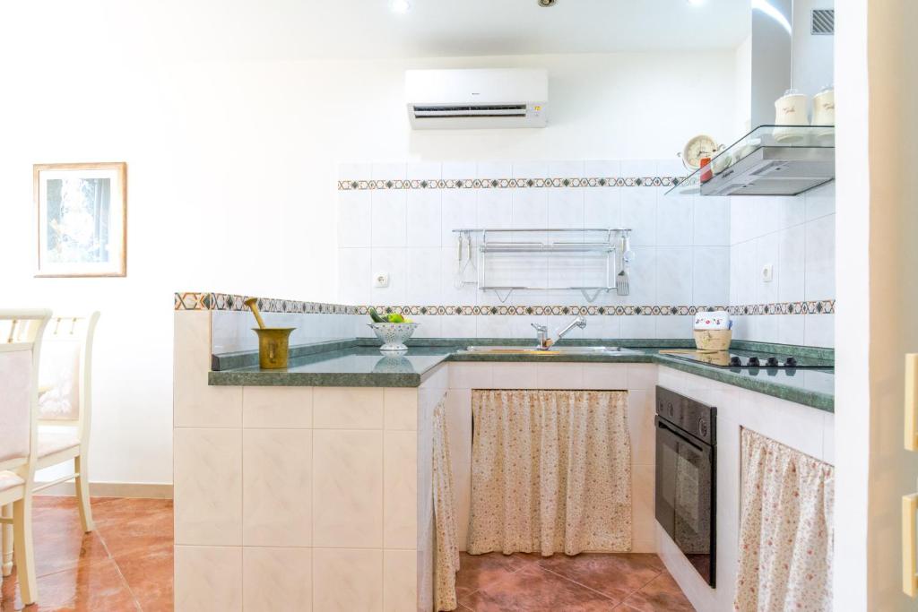 Kuchyňa alebo kuchynka v ubytovaní Apartment Mandalina
