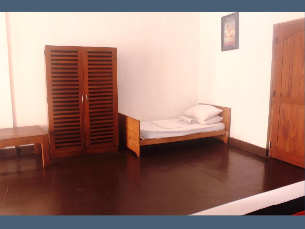 Postel nebo postele na pokoji v ubytování 256 Townhouse Rest