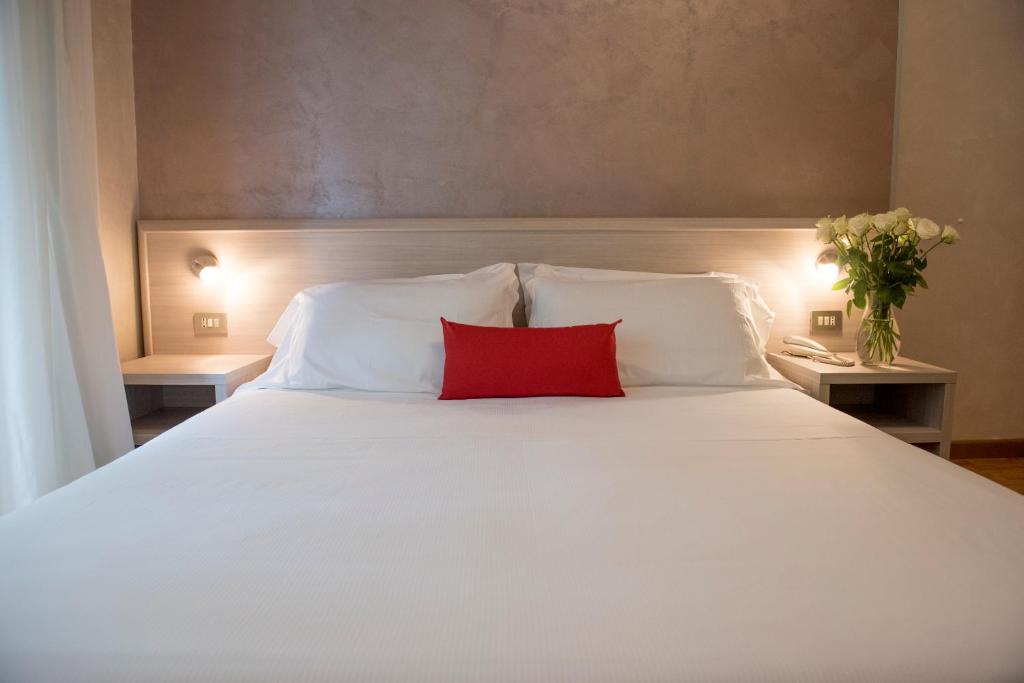 Postel nebo postele na pokoji v ubytování Hotel Lis